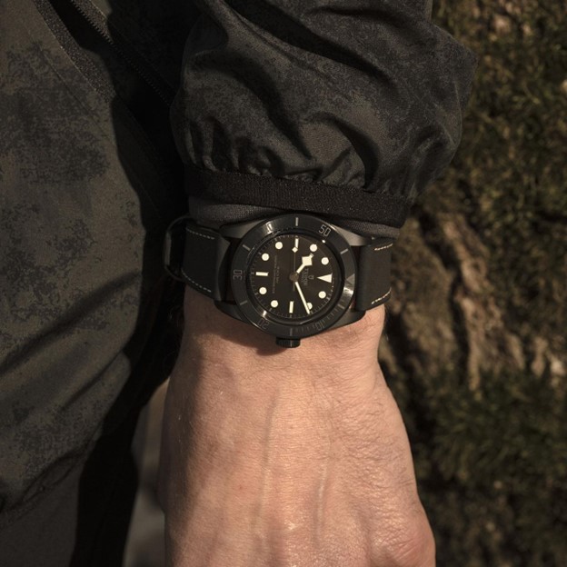 All black TUDOR Black Bay ceramic watch with hybrid leather and rubber strap